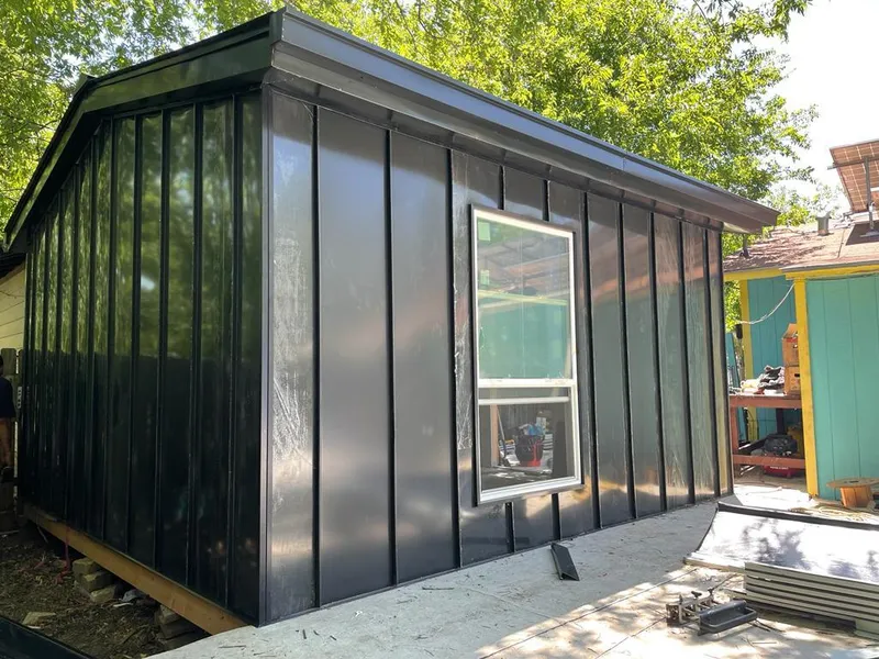 Black standing seam metal wall panels for Roof Inspection in Somers Point