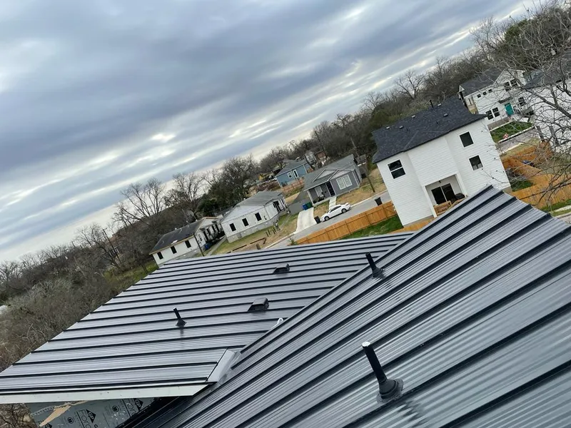 Standing seam metal roof panels with vents for Skylight Repair in Somers Point